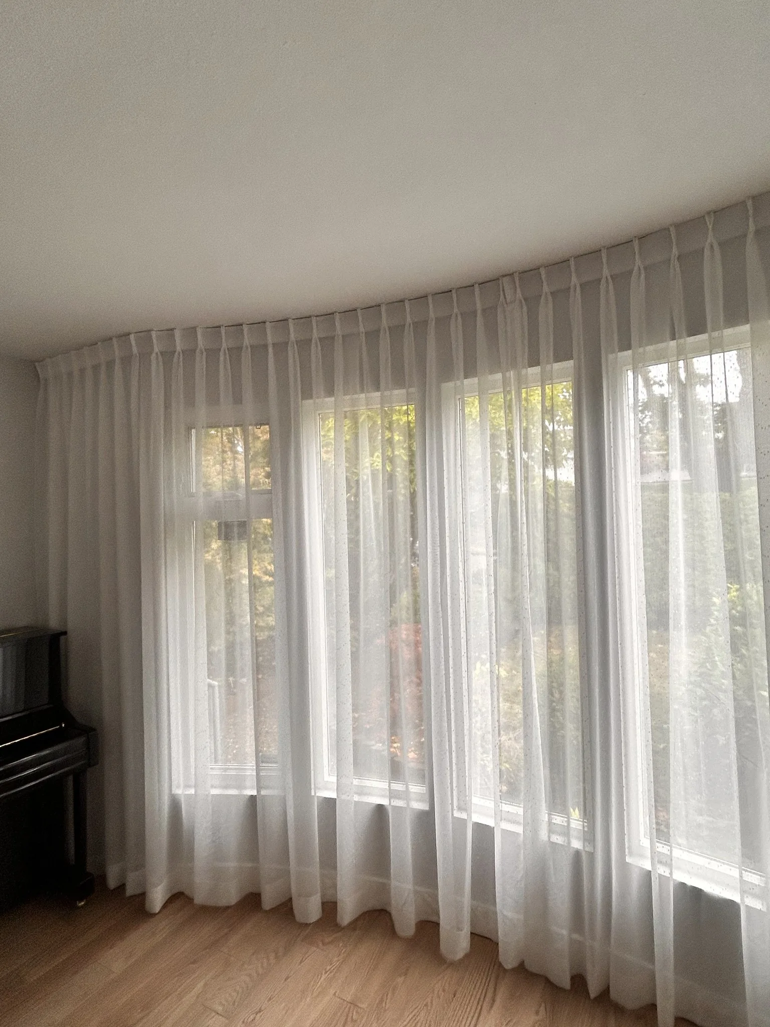Sheer curtains in a room from the AAA Blinds photo library
